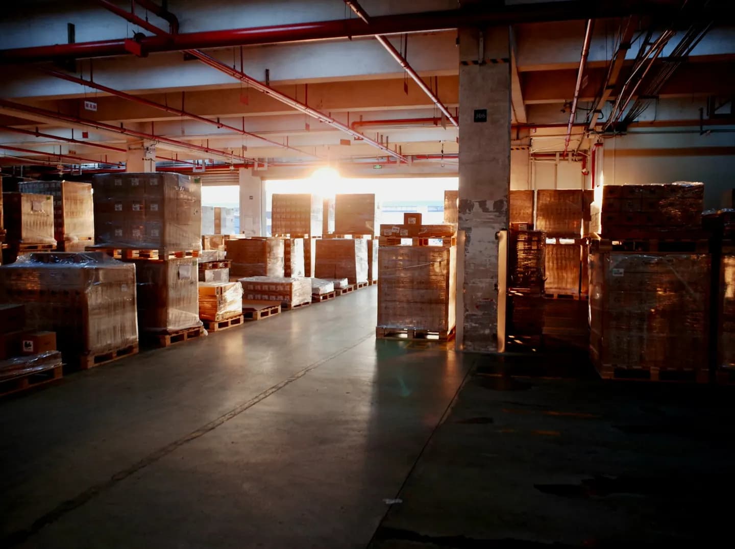 Logistics operations team reviewing shipments on screens
